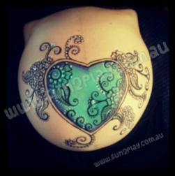 This belly painting was inspired by a henna design